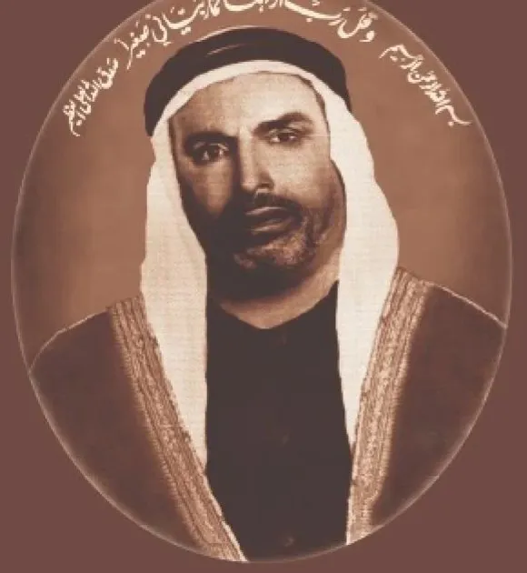 Sepia oval portrait of the late Haj Taher Ahmed Albaghli in a bisht